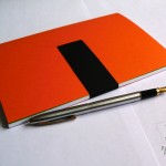 adv_orange_with_pen